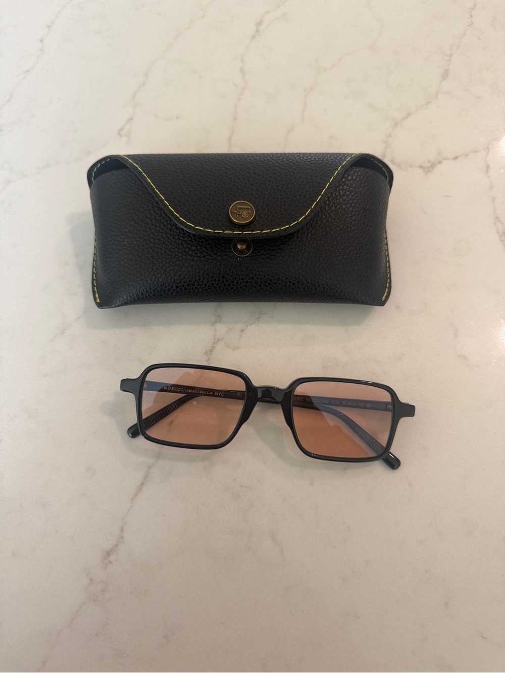 MOSCOT Shindig Black Frame Sunglasses with Pink Lenses